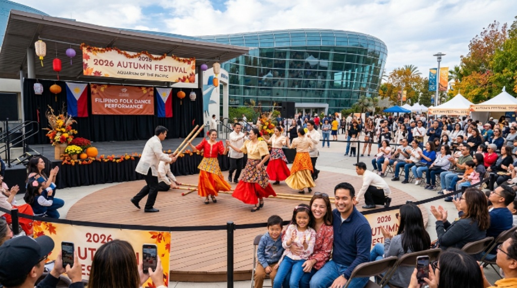 Visitors watching a Filipino folk dance performance at the 2026 Aquarium of the Pacific Autumn Festival