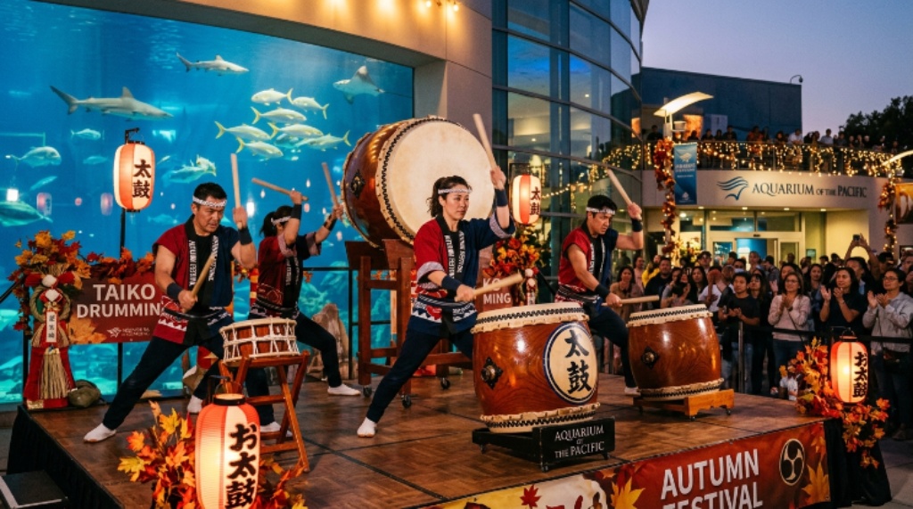 Taiko drummers performing on stage at the Aquarium of the Pacific Autumn Festival cultural event